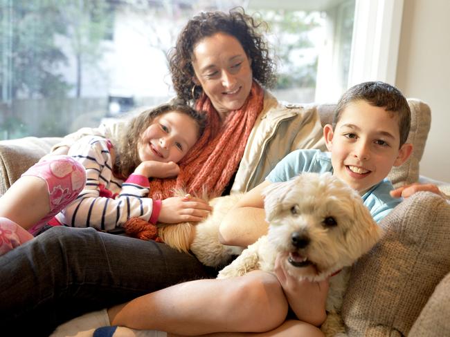 Lisa Hills with children Gemma and Josh and newly adopted Beanie the rescue dog. Photo Jeremy Piper