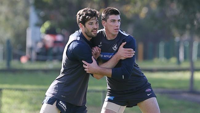 Levi Casboult and Matthew Kreuzer train at a St Kilda park this morning. Picture: Wayne Ludbey