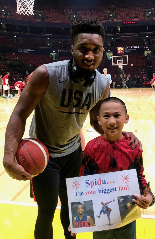 Little Xier meeting his idol Donovan Mitchell at Olympic Park last night. Picture: Rollie Pontigon