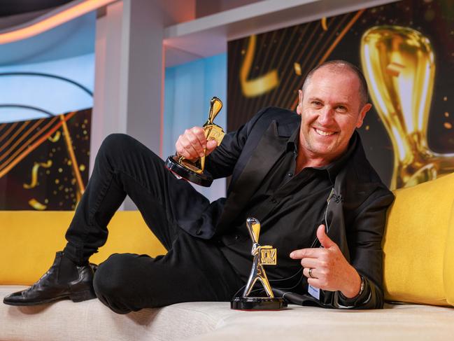 Gold Logie winner Larry Emdur, who got his tattoo live on air during The Morning Show, poses with his awards. Picture: Justin Lloyd.