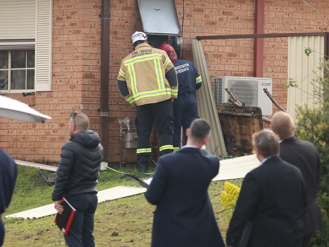 Investigators at the scene. Picture: John Grainger