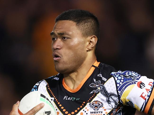 SYDNEY, AUSTRALIA - MAY 20:  Stefano Utoikamanu of the Tigers makes a break during the round 12 NRL match between Wests Tigers and North Queensland Cowboys at Leichhardt Oval on May 20, 2023 in Sydney, Australia. (Photo by Matt King/Getty Images)