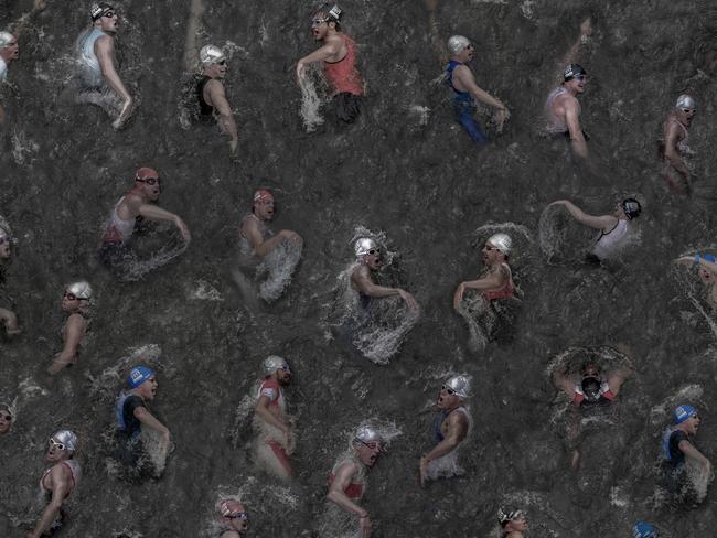 German snapper Klaus Lenzen was overhead when he captured Every Breath You Take, composed of 35 individual swimmers competing in the Dusseldorf triathlon.