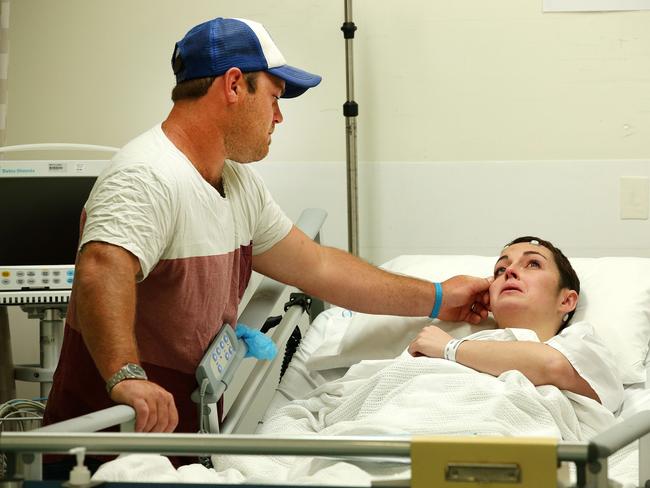 Natalie Kellalea, with husband Alex, before undergoing a world-first procedure to deliver epilepsy drugs directly to her brain. Picture: Andrew Tauber