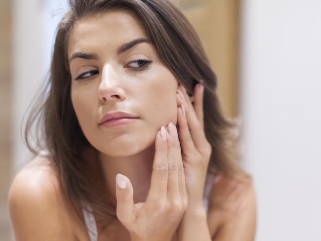 Woman taking care of her skin