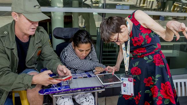 Marlena Katene with her facilitator Bert Hibbert raise their concerns with Meredith Allan, President-Elect of the ISAAC and National Treasurer of ISAAC-Australia. Picture: Jerad Williams