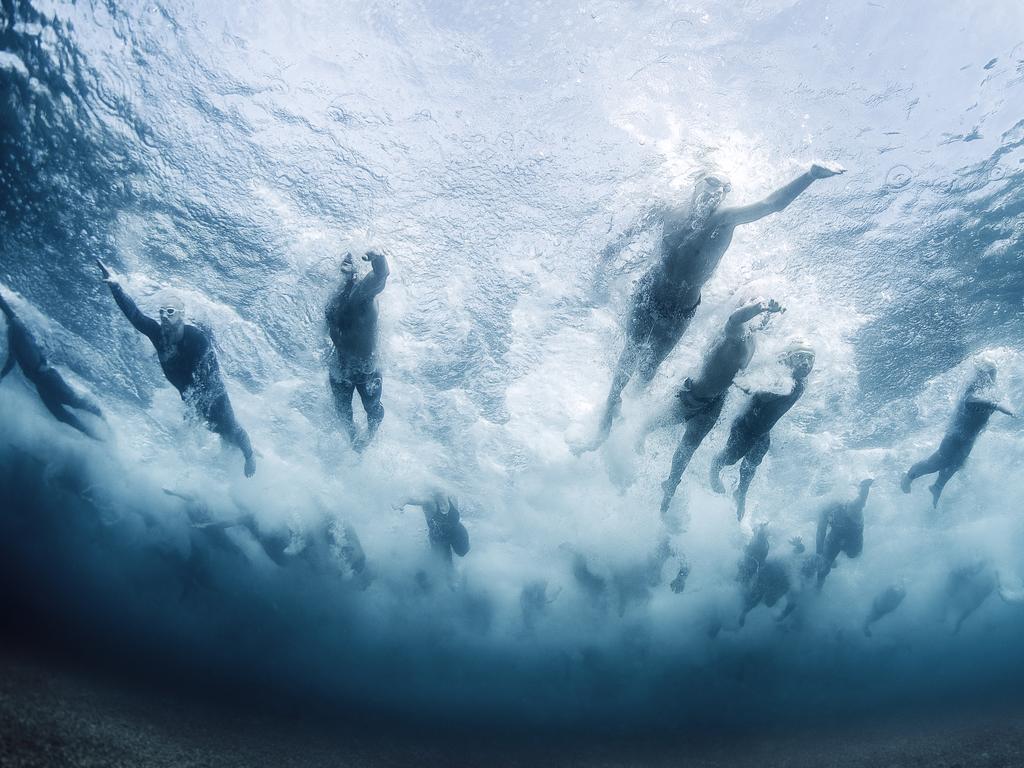 I took this picture during the Swim the island, a competition of swimming in the sea, where contestants will compete over a distance of 6 kilometers, making a cirle around the island of Bergeggi in Liguria The photo was taken during the start, when the group is still compact and have not yet outlined the balance of the race Location: Bergeggi/Italy Picture: Davide Lopresti/UPY2016