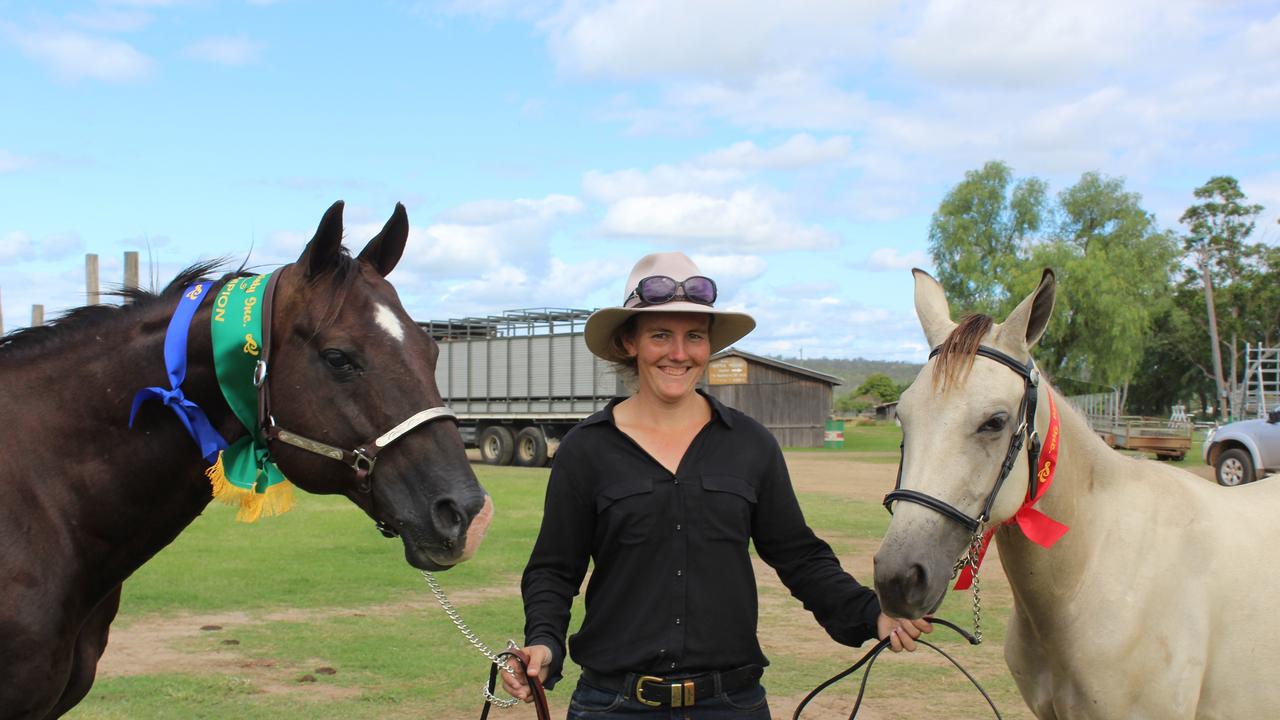 Horse owner Deejay with her stallion Flying dollar doc five pot and filly Sweetie gonna givem lip at the Murgon Show. Photo: Laura Blackmore