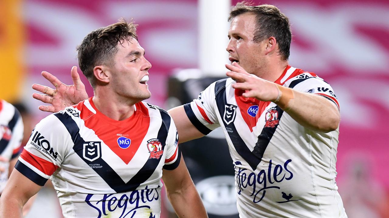 Kyle Flanagan of the Roosters celebrates after scoring a try.
