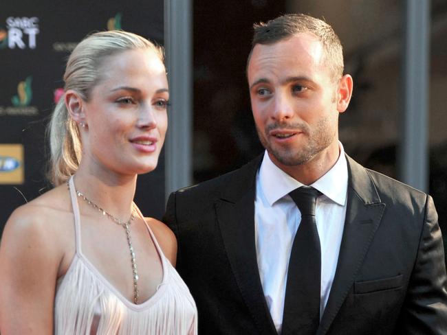 South African Paralympian athlete Oscar Pistorius with girlfriend Reeva Steenkamp. Picture: AFP