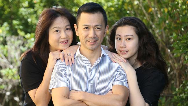 Minehiko Shimodaira with his wife Saori and daughter Luka, 14. Picture: Glenn Hampson