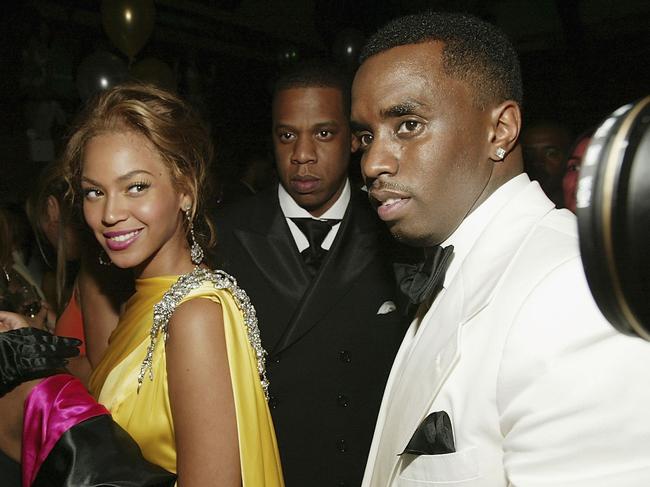 The couple pictured with Sean ‘Diddy’ Combs at a CFDA after-party in New York City on June 7, 2004. Picture: Evan Agostini/Getty Images