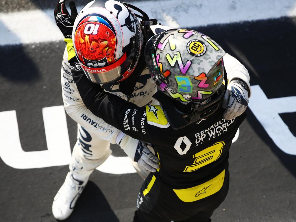 Daniel Ricciardo congratulates Pierre Gasly. (Photo by Mark Thompson/Getty Images)