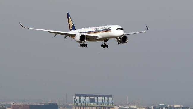 Singapore Airlines flight coming into land at Melbourne Airport in April. Picture: David Crosling