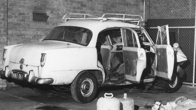 The Holden sedan in which Crawford had stashed the four bodies before pushing it over a cliff.