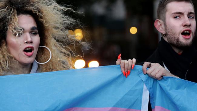 The trans flag flies at a New York rally for LGBTQI+ rights. Picture:Getty Images/AFP