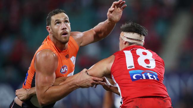 Shane Mumford dominated Sydney’s Callum Sinclair in the ruck on Saturday night. Picture: Phil Hillyard