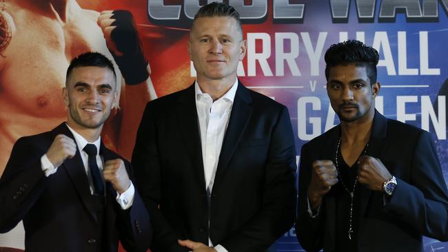 Promoter Danny Green (centre) with Andrew Maloney (left) and and Elton Dharry. Maloney and Dharry will fight for a world title on Friday night. Picture: Getty Images