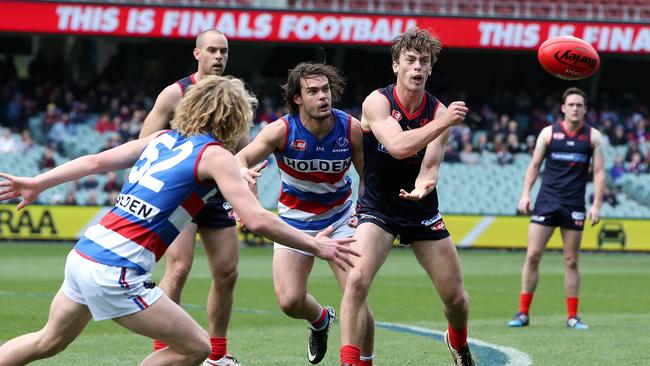 Partington gets a handball away for Norwood in the 2015 elimination final against Central District. Picture: Sarah Reed