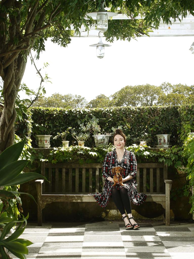 Leona Edmiston with dog Daisy, on the patio area of their home. Picture: John Appleyard