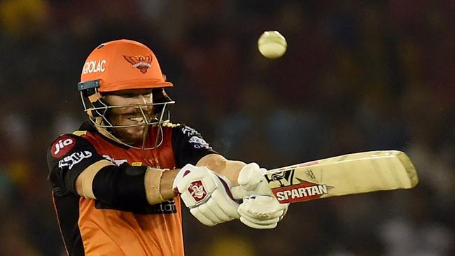 Sunrisers Hyderabad batsman David Warner plays a shot during the 2019 Indian Premier League (IPL) Twenty20 cricket match between Kings XI Punjab and Sunrisers Hyderabad at the Punjab Cricket Association Stadium in Mohali on April 8, 2019. (Photo by Money SHARMA / AFP) / ----IMAGE RESTRICTED TO EDITORIAL USE - STRICTLY NO COMMERCIAL USE----- / GETTYOUT