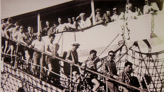 Postwar Italian immigrants arrive in Cairns to work on the cane fields.