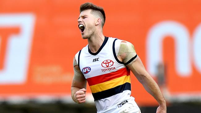 Bryce Gibbs of the Crows celebrates kicking a goal during the round nine match against the Brisbane Lions. Picture: Bradley Kanaris/Getty Images