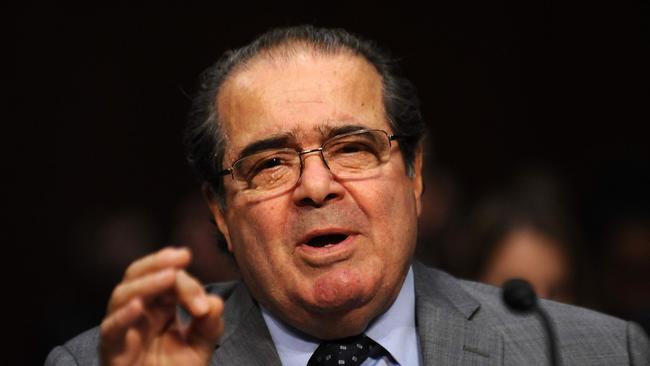 (FILES) This file photo taken on October 05, 2011 shows US Supreme Court Justice Antonin Scalia testifying before the Senate Judiciary Committee in Washington, DC, on October 5, 2011. Justice Scalia dies at 79 on February 13, 2016, according to a statement by Texas Governor Greg Abbott. / AFP / JEWEL SAMAD