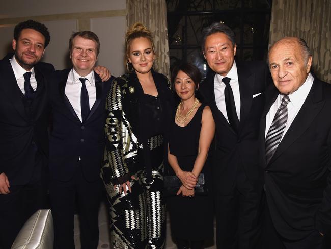 Adele with executives from Sony Music at a post-Grammys party in Bel-Air. Picture: Getty Images