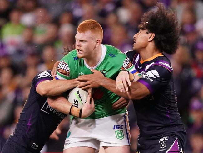 Corey Horsburgh of the Raiders is tackled during the NRL Second Qualifying Final match between the Melbourne Storm and the Canberra Raiders at AAMI Park in Melbourne, Saturday, September 14, 2019.  (AAP Image/Scott Barbour) NO ARCHIVING, EDITORIAL USE ONLY