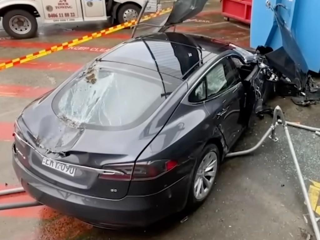 Two people were hospitalised following a dramatic crash involving a Tesla Model S in Sydney. Picture: Nine Network