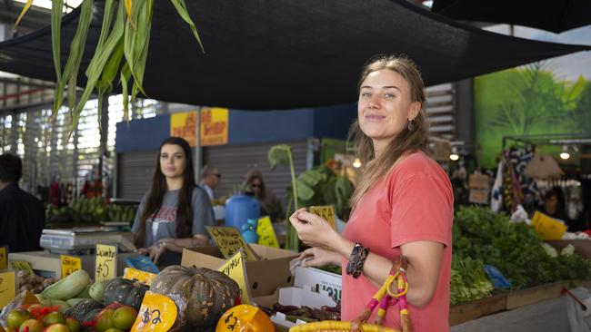 Cairns local Bri Ferguson buying discount fruit and vegetables at Rusty’s Markets. Picture Emily Barker