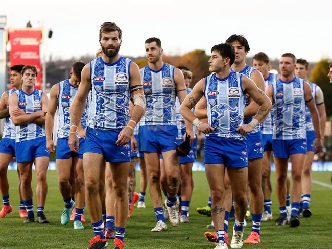 HOBART, AUSTRALIA - MAY 25: The Kangaroos look dejected after a loss during the 2024 AFL Round 11 match between the North Melbourne Kangaroos and Yartapuulti (Port Adelaide) at Blundstone Arena on May 25, 2024 in Hobart, Australia. (Photo by Michael Willson/AFL Photos via Getty Images)