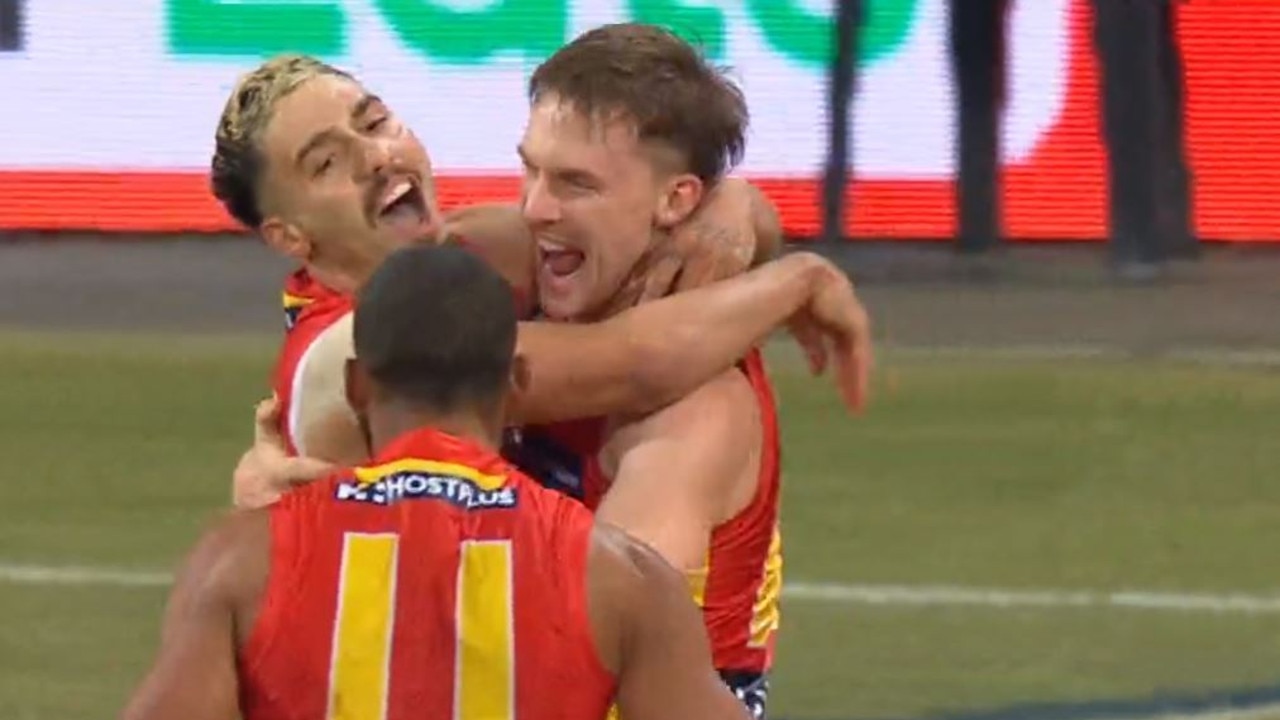 Izak Rankine celebrates his first goal in the AFL.