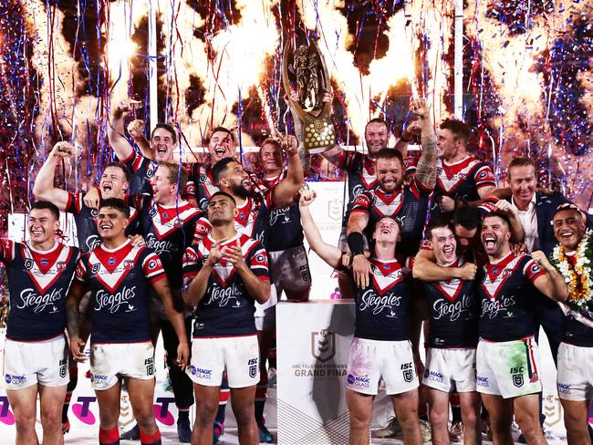 Roosters players celebrate victory in the 2019 NRL Grand Final, the last time the club fielded a full-strength side. Picture: Getty Images