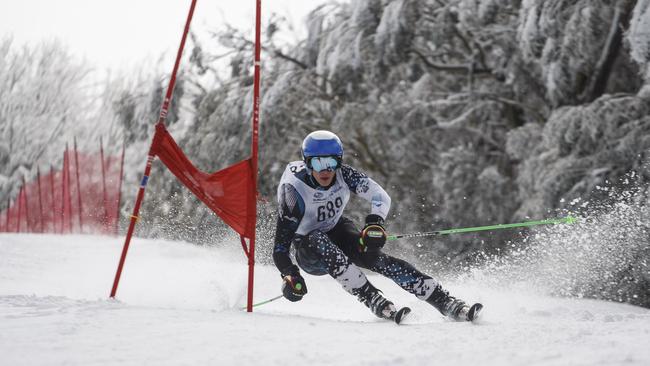 Ski cross involves skiers racing against each other down a sloped course.