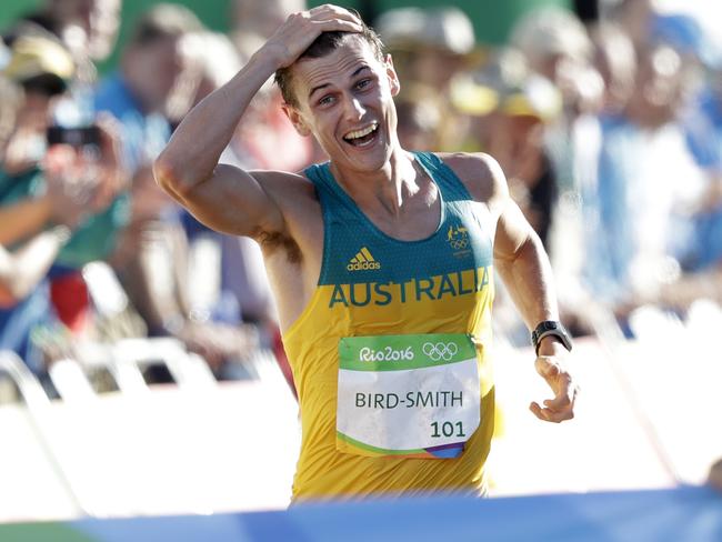 Dane Bird-Smith, of Australia, reacts with surprise as he approaches the finish line to place third in the Mens 20 K race walk at the 2016 Summer Olympics in Rio de Janeiro, Brazil, Friday, Aug. 12, 2016. (AP Photo/Robert F. Bukaty)
