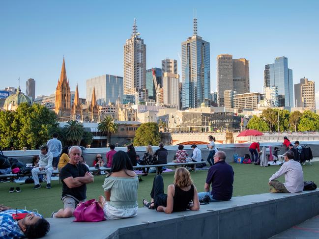 Revellers get an early spot for the fireworks in Melbourne. Picture: Mark Stewart