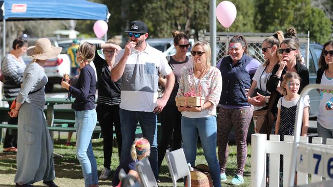 The fundraising cricket day was just one of the ways the community has shown their support for the grieving family.