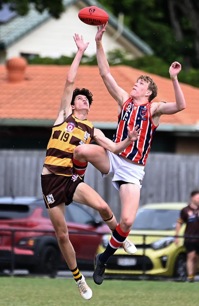 Aspley player Duncan Lewis and Wilston Grange player Marcus Zipf. Picture, John Gass