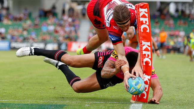 The moment just before Cody Ramsey planted the ball on the sideline, which was awarded a try by the referees. Picture: Getty Images.