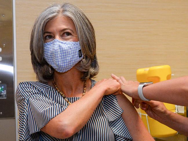 Nicola Spurrier gets her second vaccine from Registered Nurse Tovah Green at the RAH, Monday March 15, 2021. Picture: Brenton Edwards