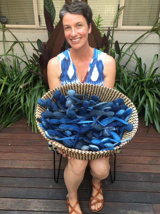 Artist Belinda Smith, of Blue Jean Sisters, with some of the denim dolls to be part of an exhibition to raise awareness of human trafficking and sexual exploitation. Pic: Briony Walker.