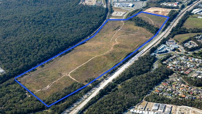 Aerial photo of Lot 1, Pacific Highway, a 54.99ha site near Westfield Coomera which is now on the market. Picture: Supplied by Colliers