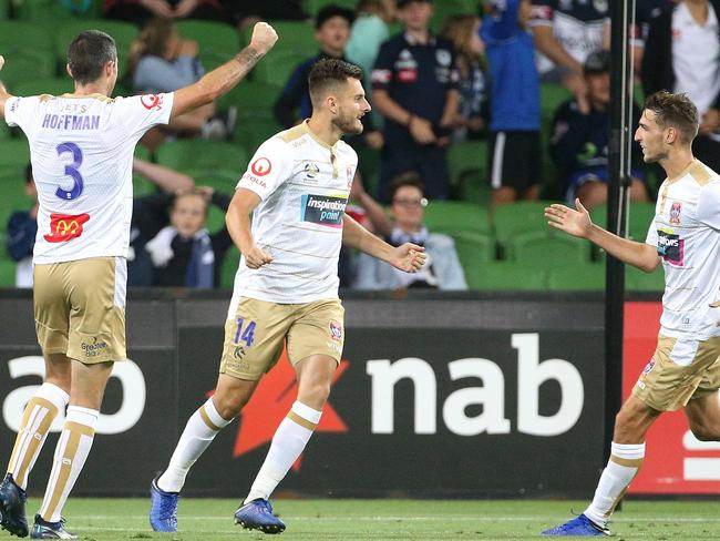 Kaine Sheppard of the Jets (centre) celebrates a goal with teammates during the Round 13 A-League match between the Melbourne Victory and the Newcastle Jets at AAMI Park in Melbourne, Saturday, January 12, 2019. (AAP Image/Hamish Blair) NO ARCHIVING, EDITORIAL USE ONLY