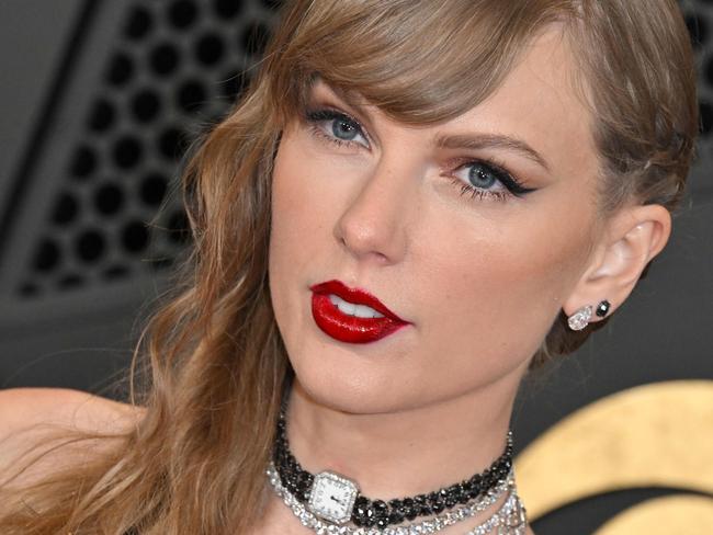 TOPSHOT - US singer-songwriter Taylor Swift arrives for the 66th Annual Grammy Awards at the Crypto.com Arena in Los Angeles on February 4, 2024. (Photo by Robyn BECK / AFP)