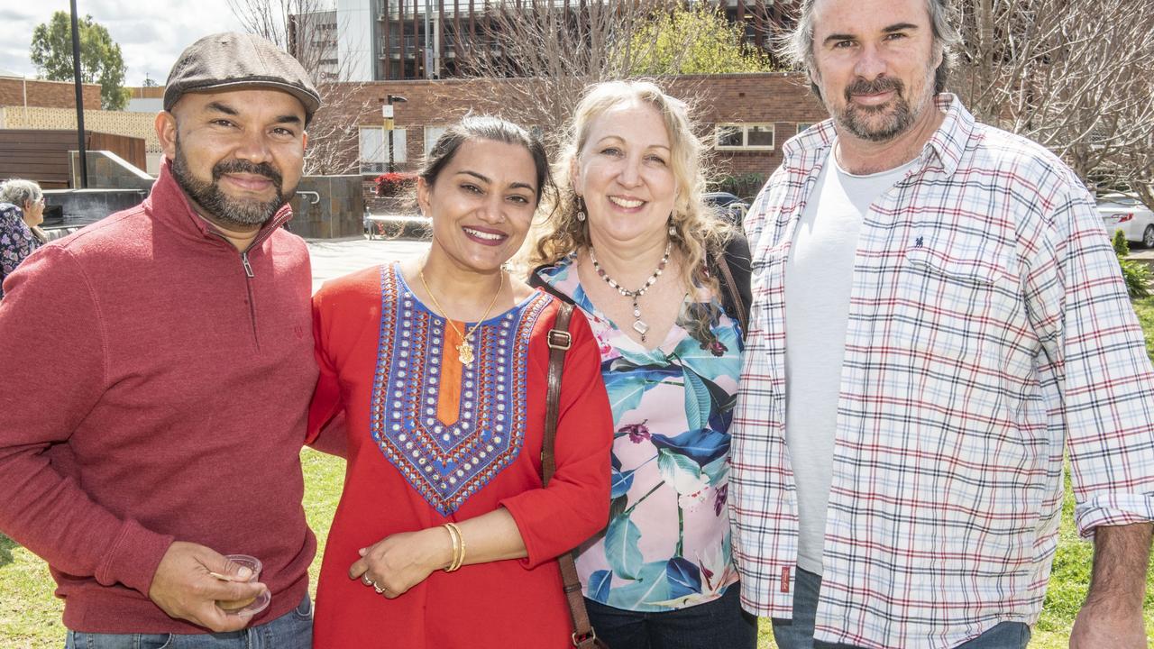 (from left) Eraj Adhikari, Sam Adhikari, Maud Bagnall and Nick Day. Krishna Janmashtami celebrations in Toowoomba Civic Square. Sunday, August 28, 2022. Picture: Nev Madsen.