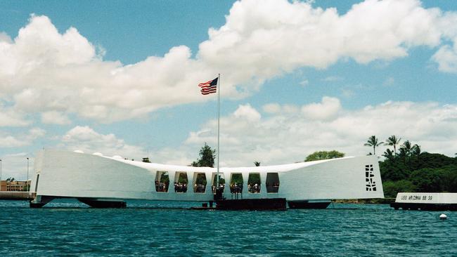 The Pearl Harbour Memorial straddles the remains of the USS Arizona.