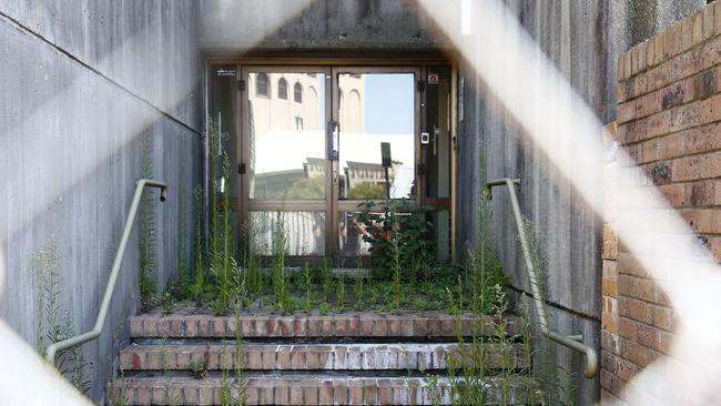 The Sirius Tower in The Rocks, remains fenced and locked up one year after the last tenants were moved out of the Public housing tower. Picture: John Appleyard