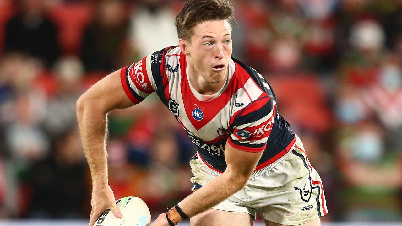 BRISBANE, AUSTRALIA - AUGUST 27: Sam Verrills of the Roosters offloads the ball during the round 24 NRL match between the Sydney Roosters and the South Sydney Rabbitohs at Suncorp Stadium on August 27, 2021, in Brisbane, Australia. (Photo by Chris Hyde/Getty Images)